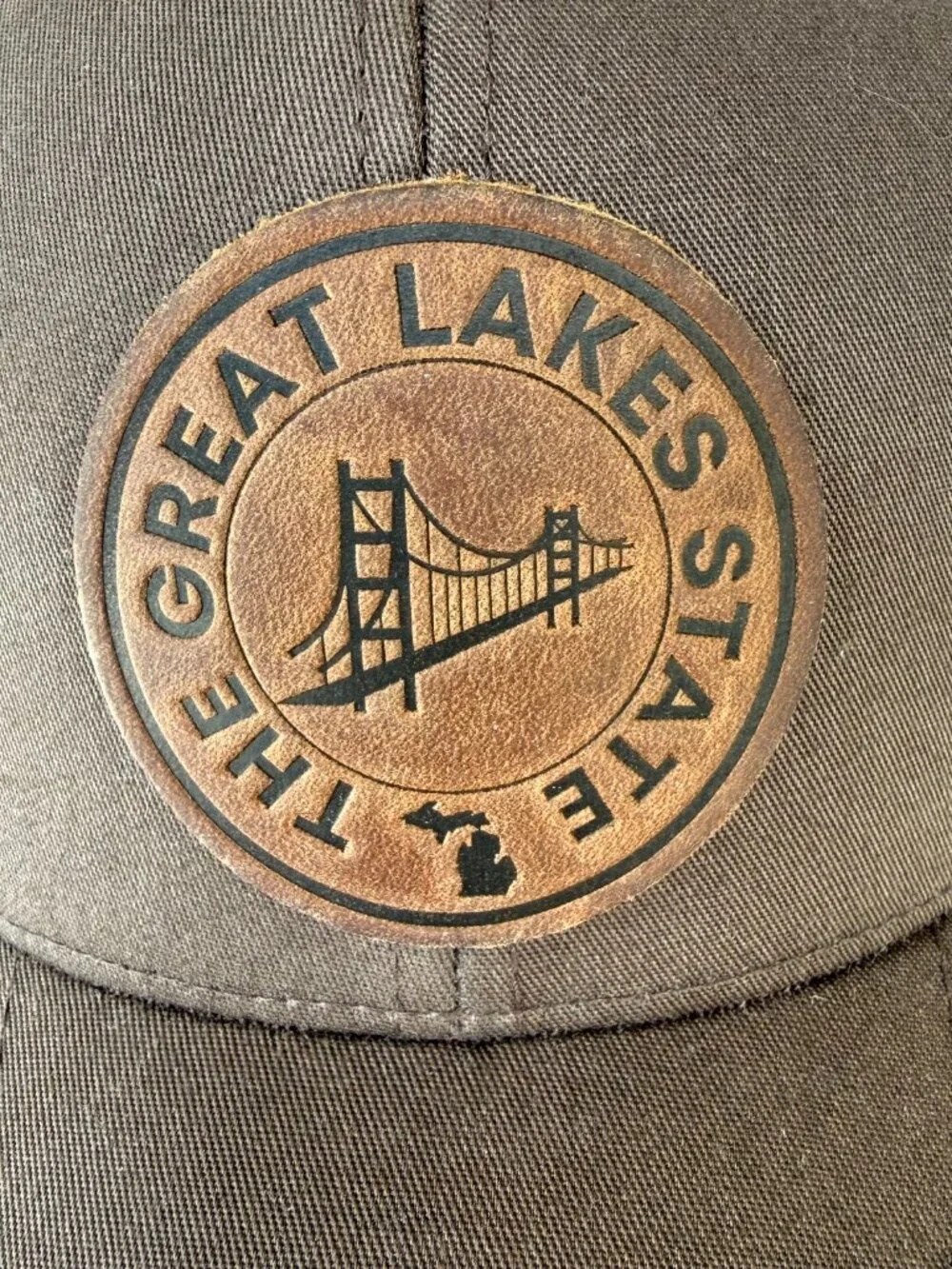 Vtg Yupoong The Great Lakes State Trucker Hat Mesh Snapback Leather Patch Khaki